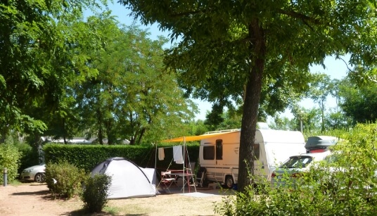 Camping pitch for caravan, Lake Cormoranche**** campsite in Ain