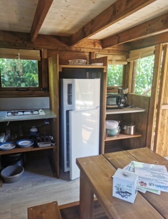 The kitchen area of the lodge tent, for rent at Lake Cormoranche**** campsite