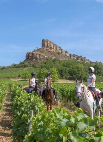 Horse ride on the Roche de Solutré in the commune of Solutré-Pouilly